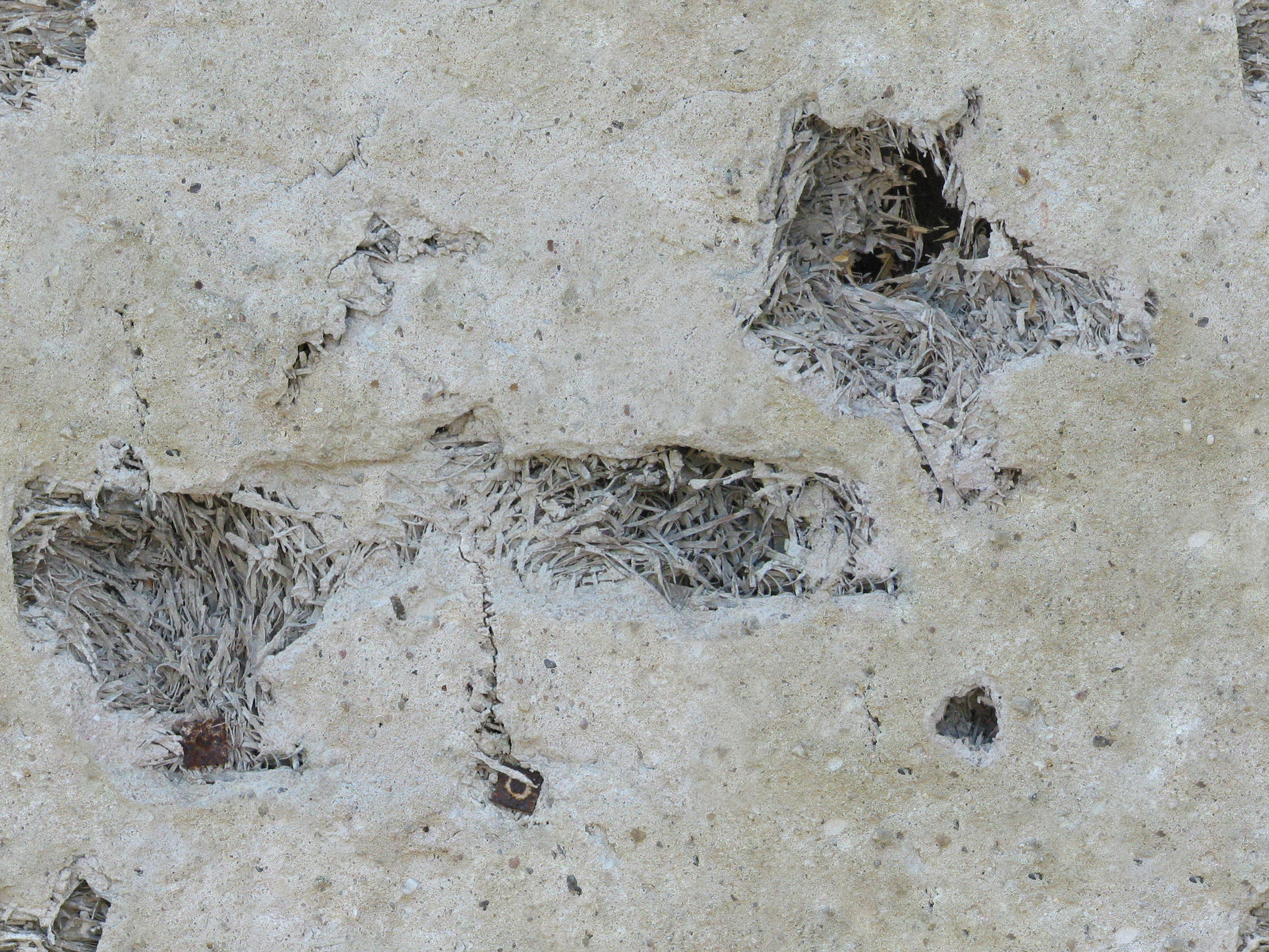 Rough plaster with holes Rough plaster with holes